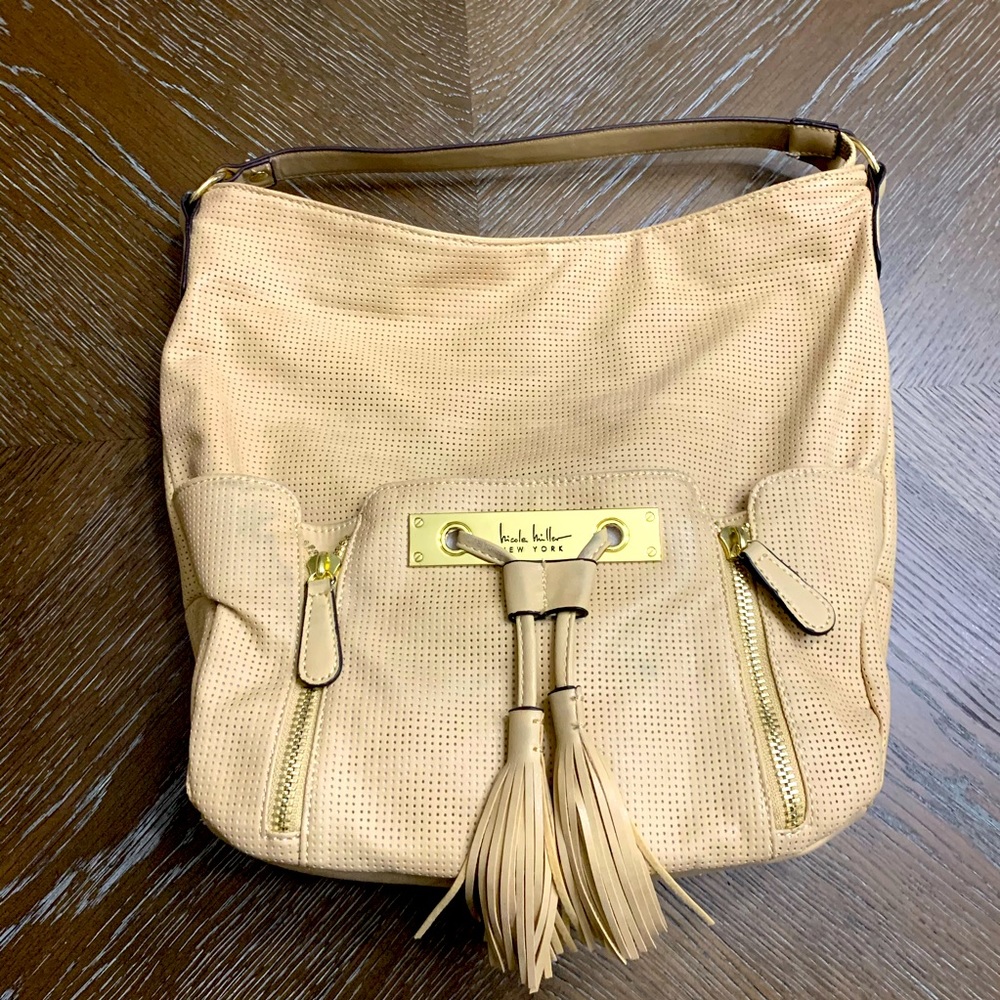Nicole Miller tan bag with tassels